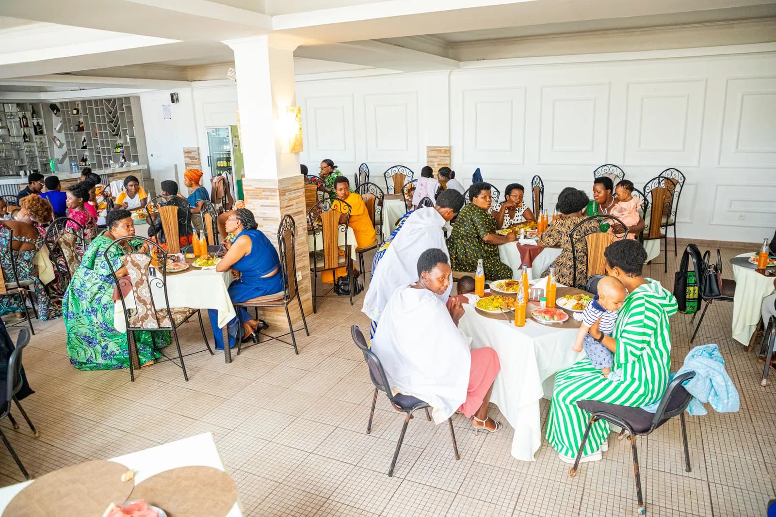 Business owners at their premises in Gitega